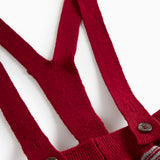 Strikkede bukser med røde og grå striber og seler til baby