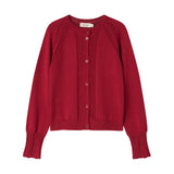 Rød julecardigan med fine hulmønstre og ribkanter til børn