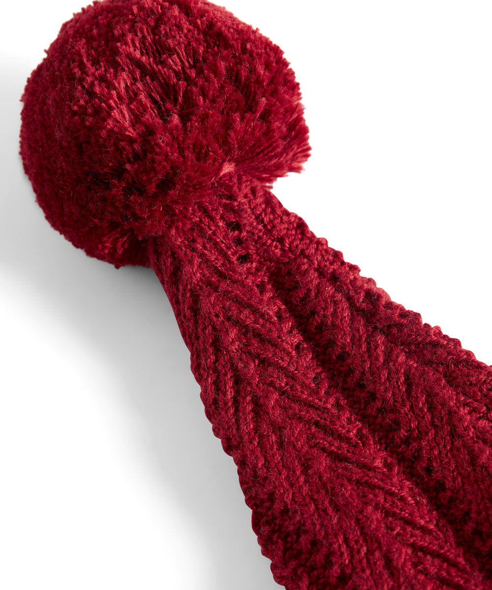 Rød strikket nissehue med kvast til baby