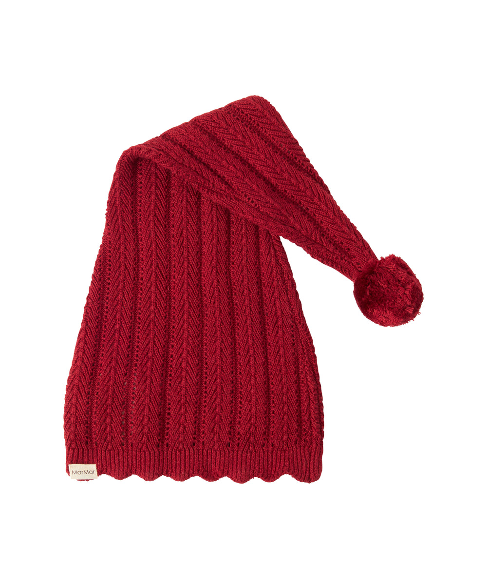 Rød strikket nissehue med kvast til baby