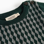 Strikket babybluse med ternet mønster i mørkegrøn