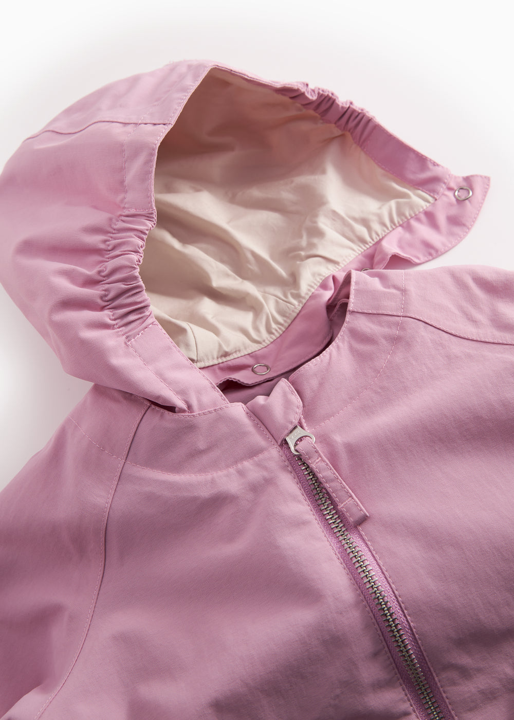 Lyserød overgangsjakke med hætte, lynlås og lommer til baby