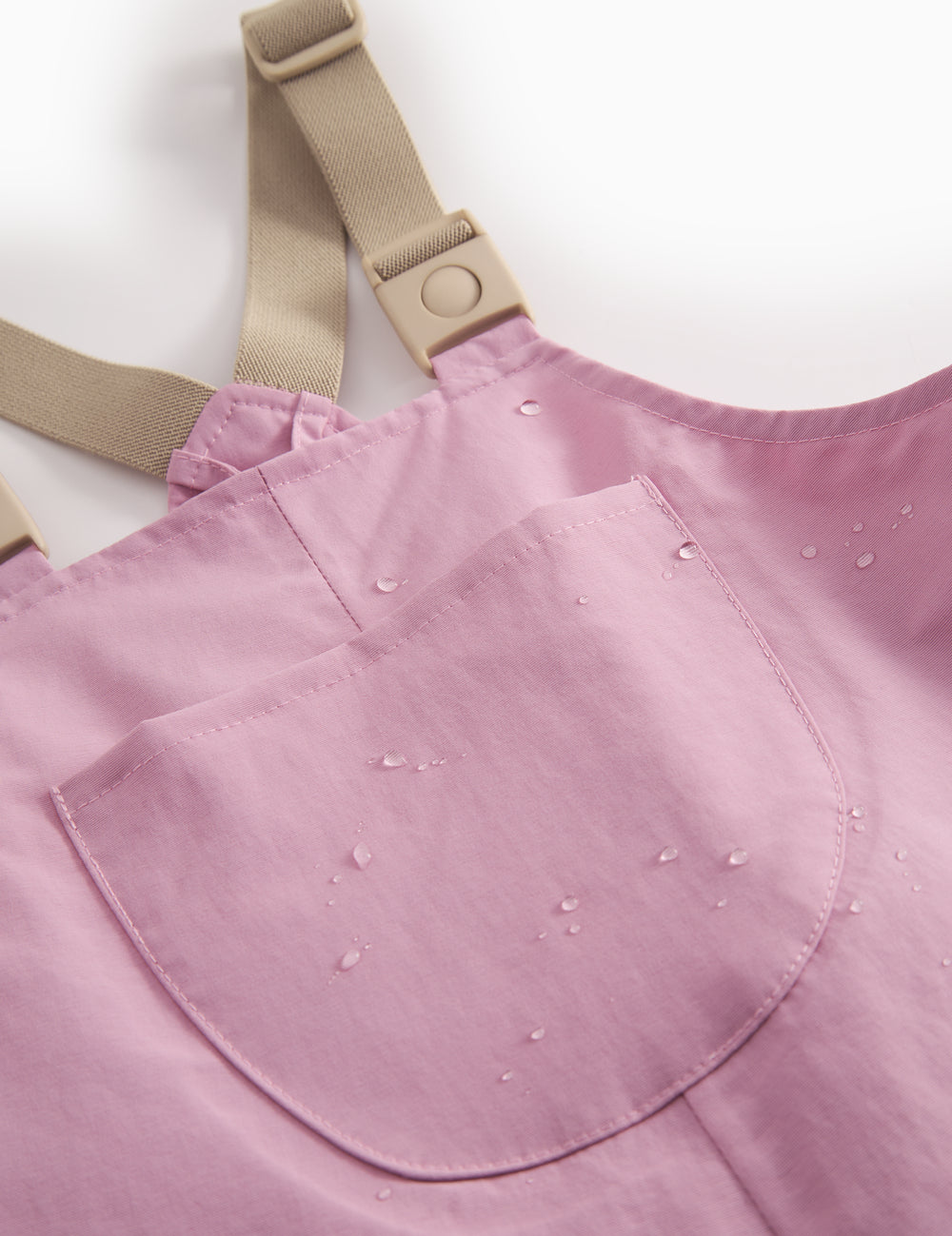 Lyserøde overtræksbukser med seler og fodstropper til baby