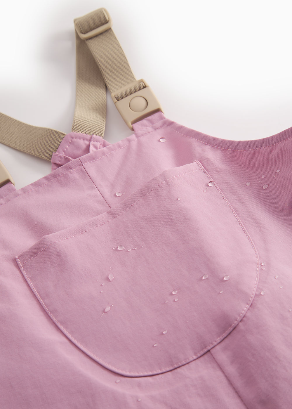 Lyserøde overtræksbukser med seler og fodstropper til baby