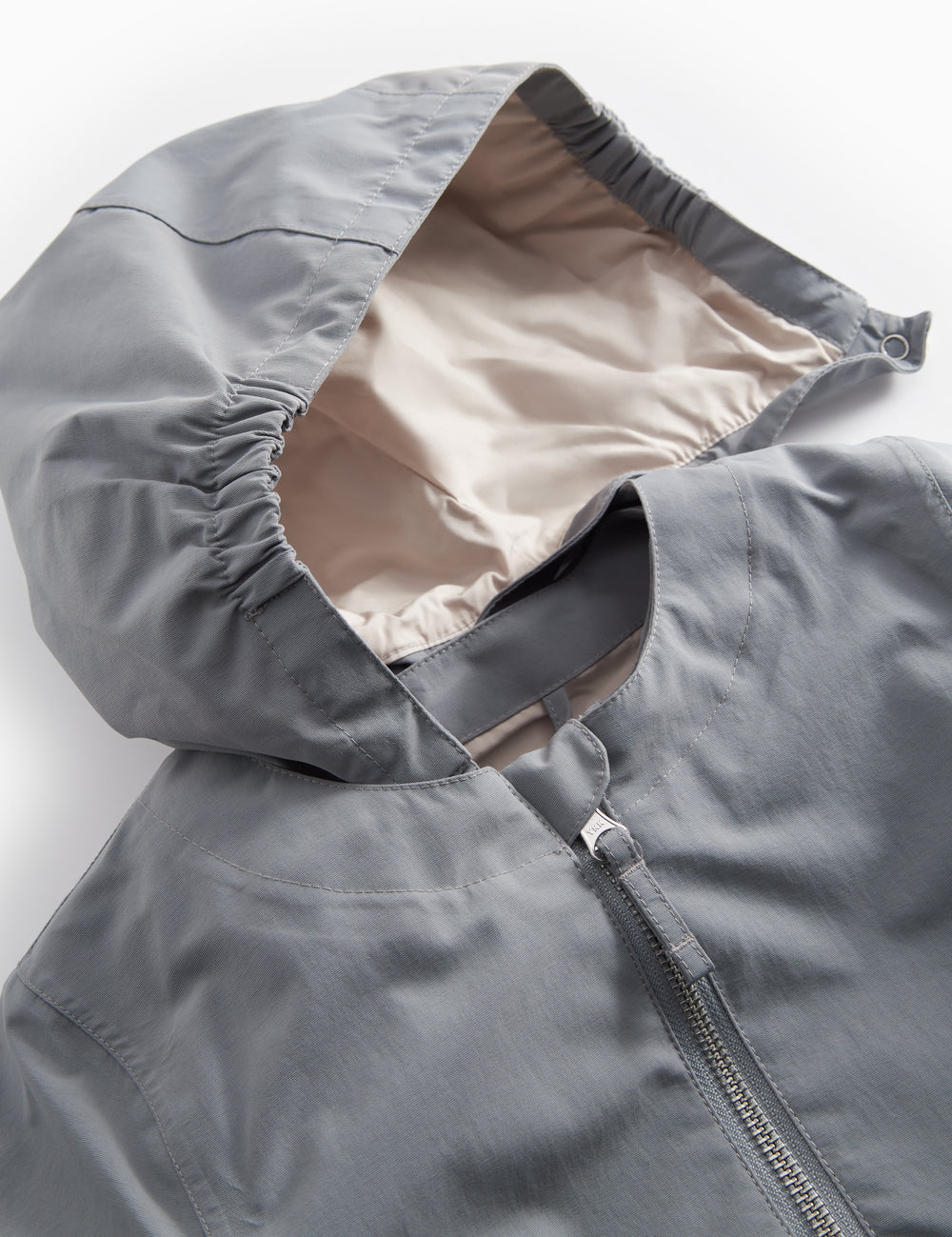 Grå overgangsjakke med hætte og lommer til børn