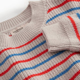 Stribet striktrøje til børn i beige med blå og røde striber