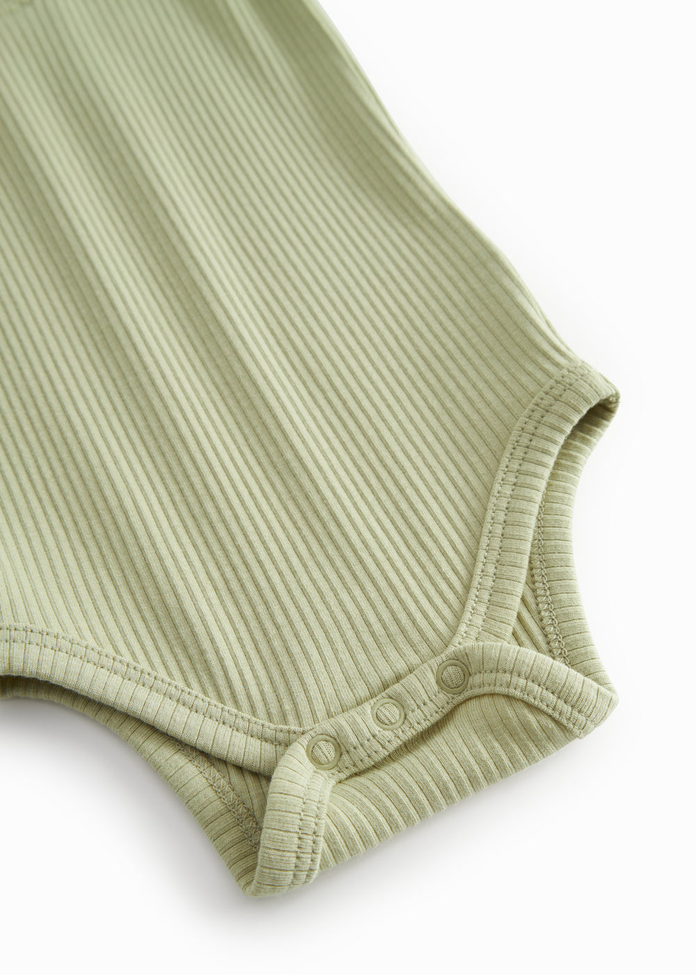 Lysegrøn langærmet baby bodystocking med stolpe knaplukning