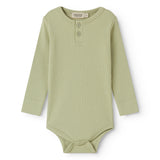 Lysegrøn langærmet baby bodystocking med stolpe knaplukning
