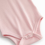 Lyserød langærmet baby bodystocking med stolpe knaplukning