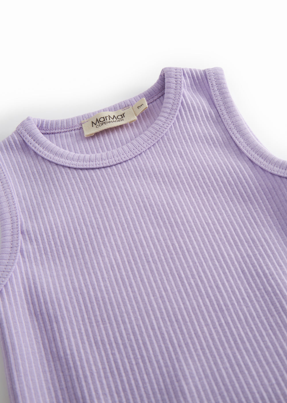 Lilla ribstrikket baby bodystocking uden ærmer