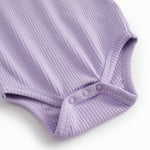 Lilla ribstrikket baby bodystocking uden ærmer