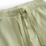 Lysegrøne baby bloomers med stolpe knaplukning