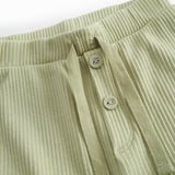 Lysegrøne baby bloomers med stolpe knaplukning