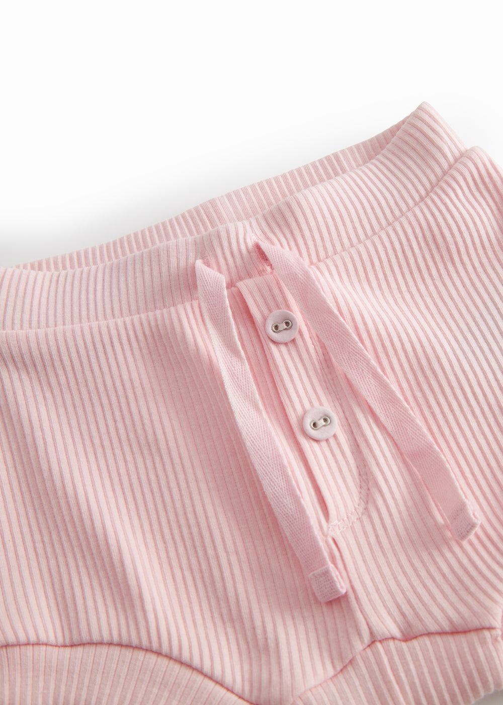 Lyserøde baby bloomers med stolpe knaplukning