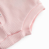 Lyserøde baby bloomers med stolpe knaplukning