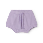 Lilla baby bloomers med stolpe knaplukning og et pyntebånd i livet