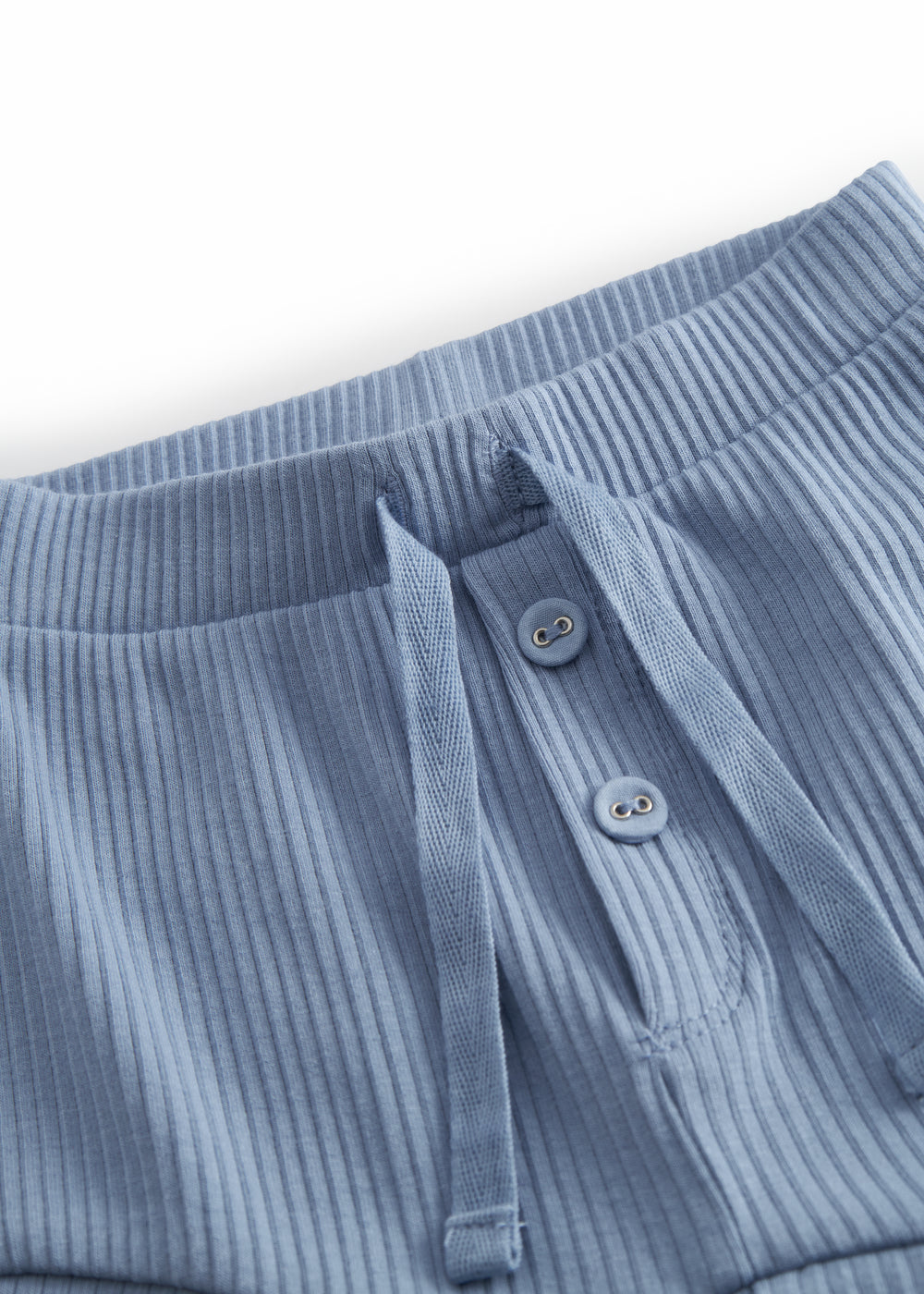 Lyseblå baby bloomers med stolpe knaplukning