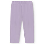 Lilla baby bukser med elastik og et pyntebånd i livet