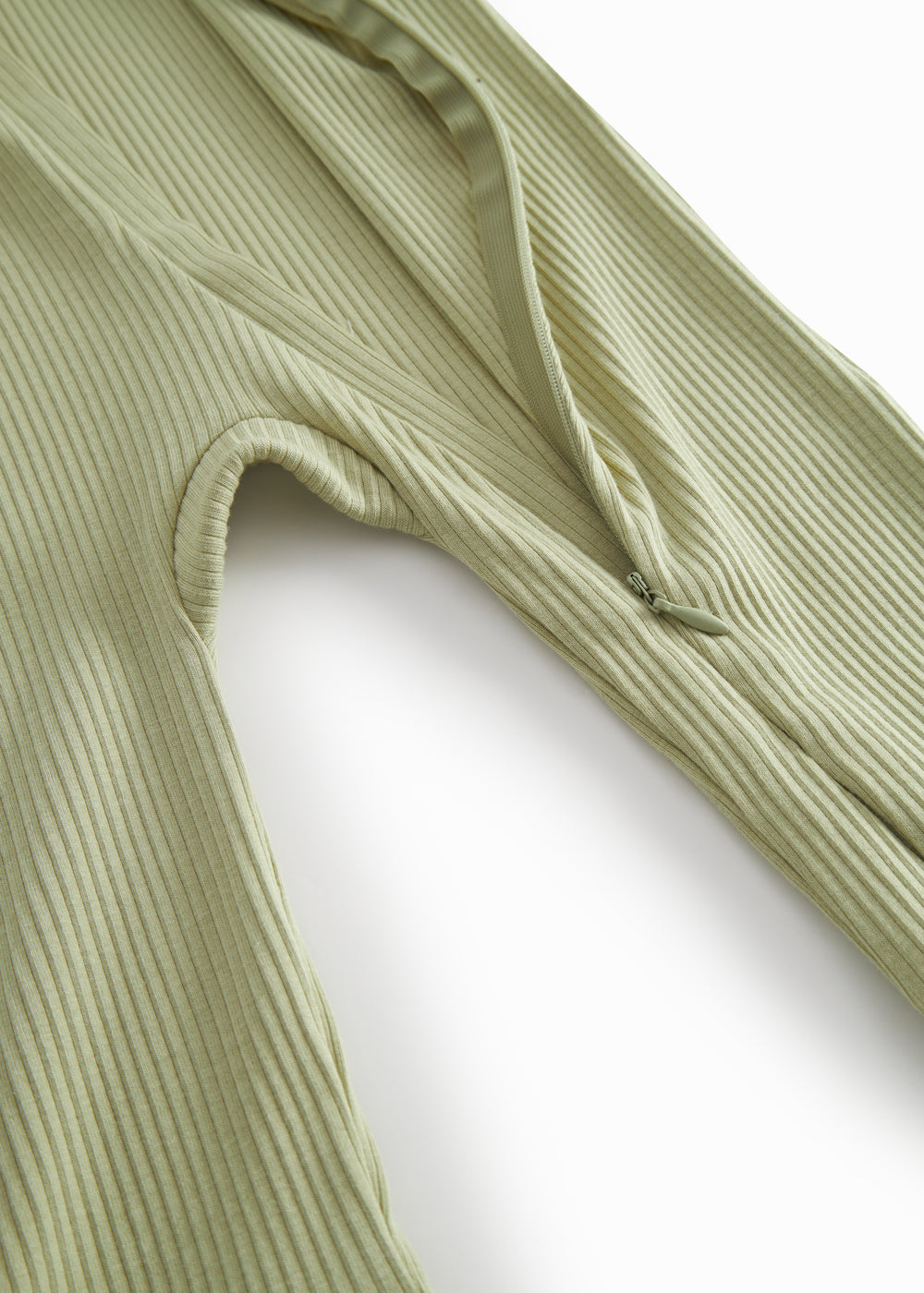 Langærmet lysegrøn heldragt med lynlås til børn