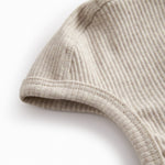 Beige baby modal hue med trykknap