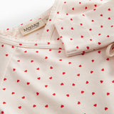 Langærmet bodystocking til nyfødte med slå-om-lukning og hjerte print