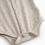 Langærmet beige bodystocking til nyfødte