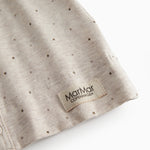 Langærmet beige bluse med print til nyfødte med knaplukning foran