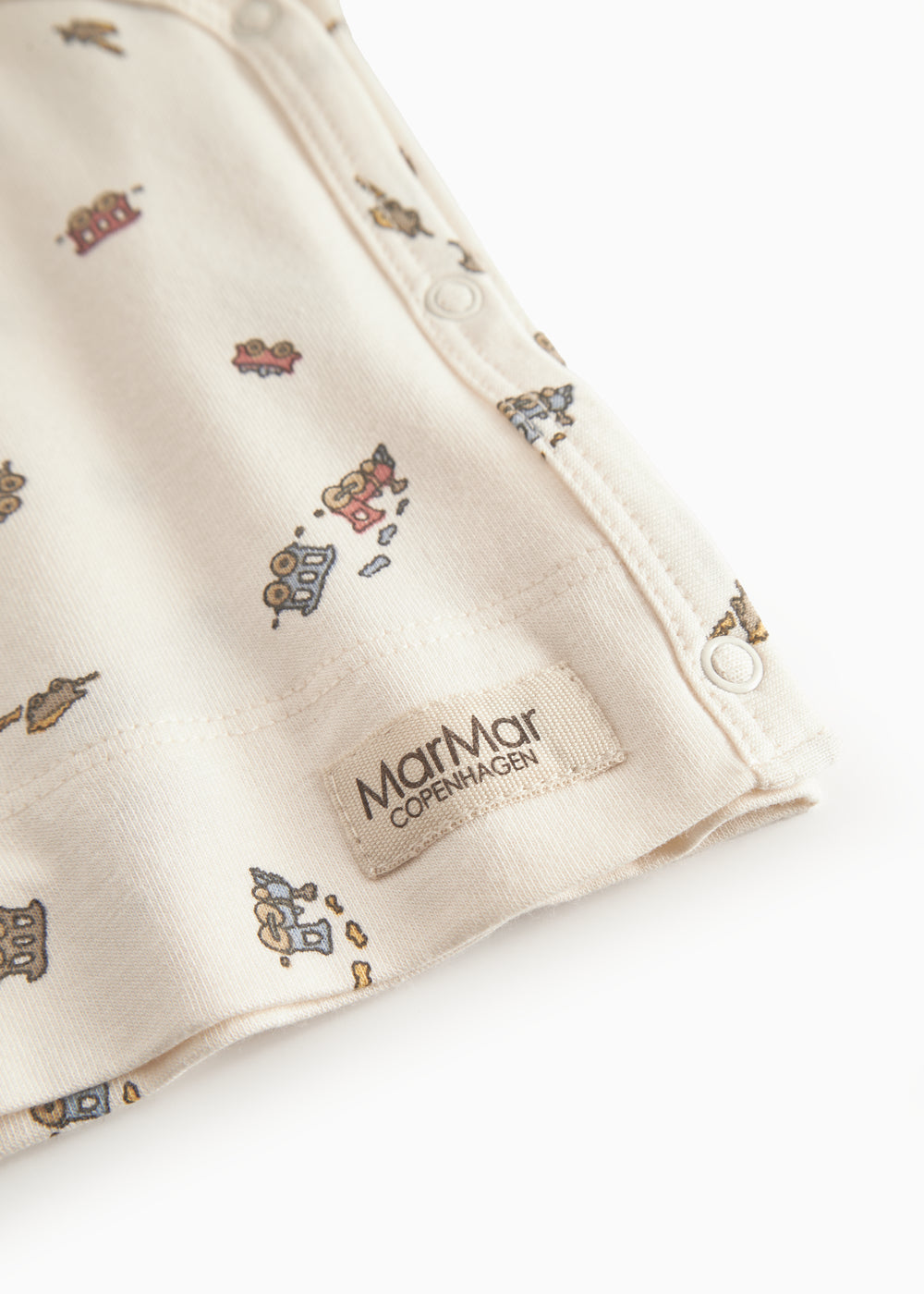 Langærmet bluse til nyfødt baby med slå-om-lukning og tog print