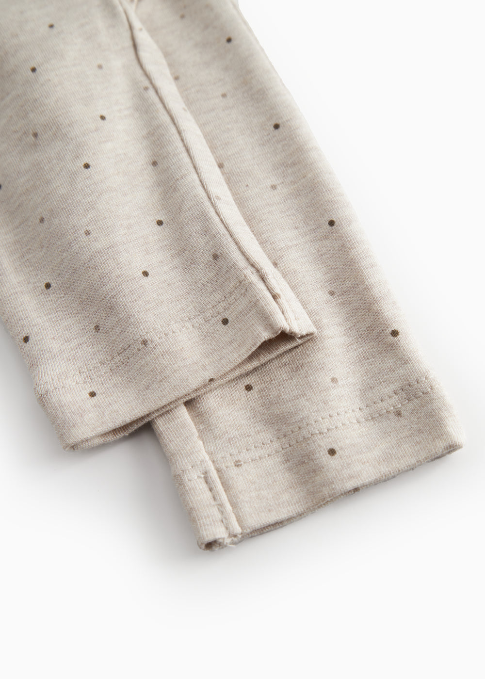 Beige baby bukser til de nyfødte med et sødt print