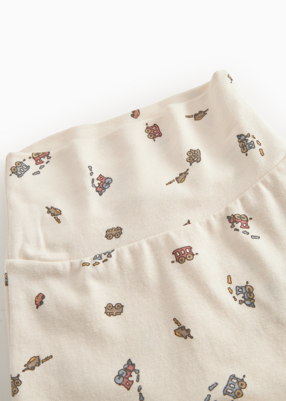 Babybukser med fødder og togprint til de nyfødte