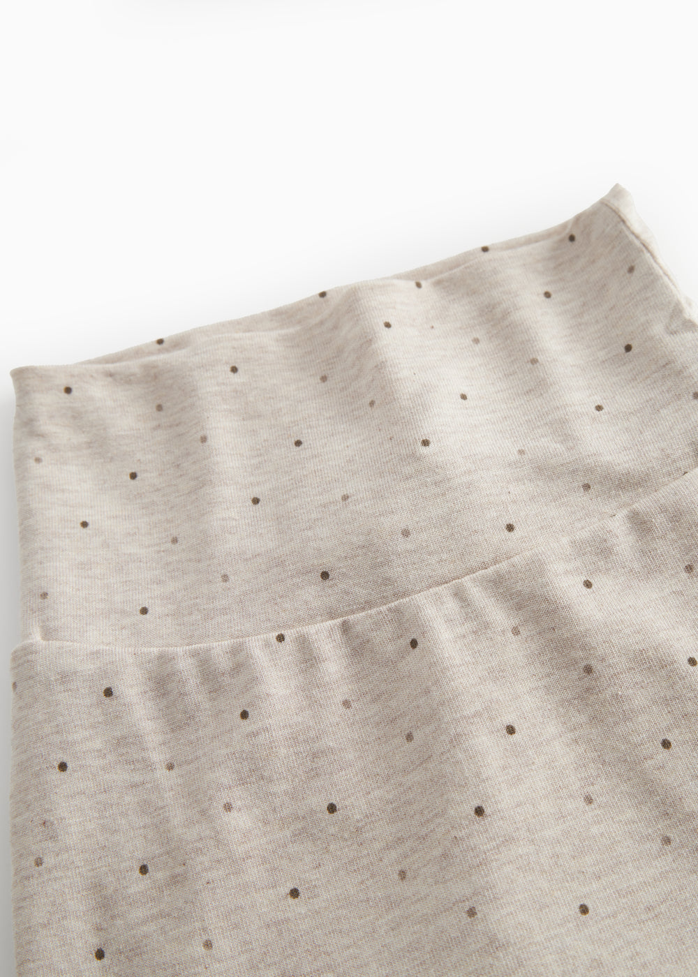 Beige baby bukser med fødder til de nyfødte med et sødt print