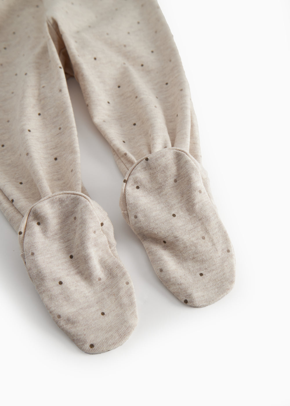 Beige baby bukser med fødder til de nyfødte med et sødt print