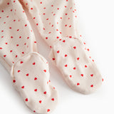 Bukser med fødder til de nyfødte med et sødt hjerte print