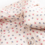 Vatteret jakke til nyfødt og baby med hætte, knaplukning og blomstermønster