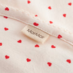 Baby tæppe med rundede hjørner, picotkanter og fint hjerte print