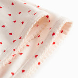 Baby tæppe med rundede hjørner, picotkanter og fint hjerte print