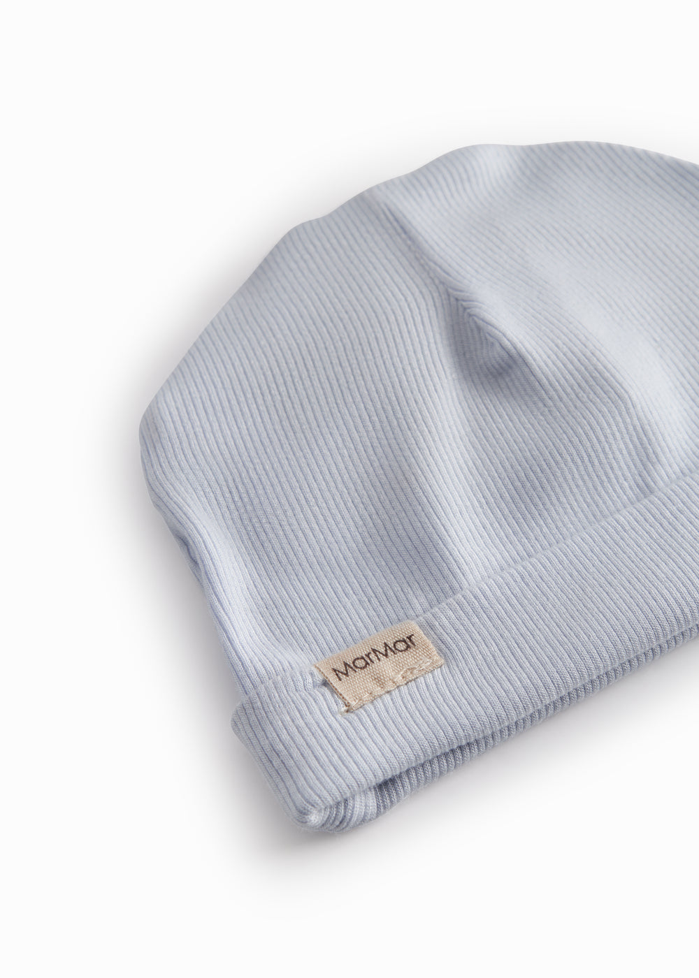 Lyseblå hue til nyfødt med kant der kan foldes ned eller op