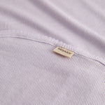 Lys lilla baby tæppe med rundede hjørner og picotkanter