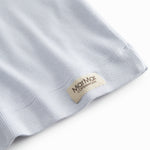 Langærmet lyseblå t-shirt til børn med stolpe knaplukning