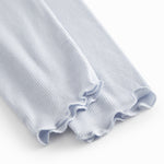 Lyseblå leggings til børn med fine flæsedetaljer forneden