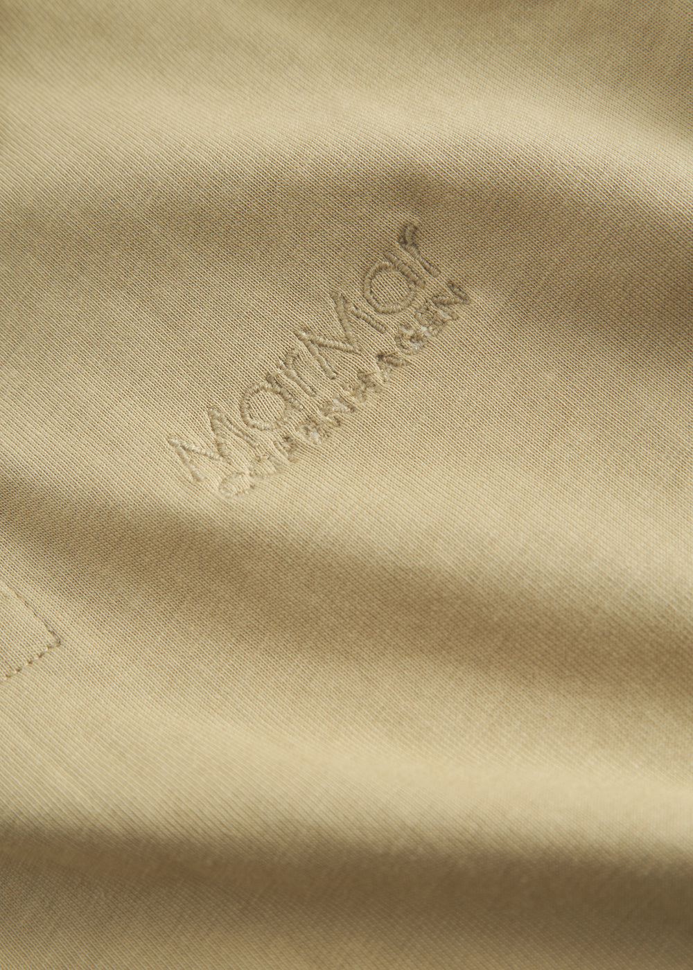 Kortærmet beige polo t-shirt til børn med krave og knaplukning