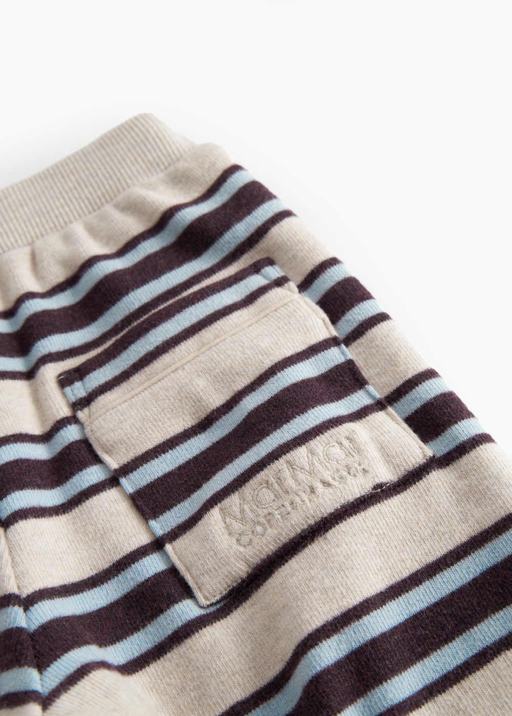 Stribede baby sweatbukser med elastik i talje og lomme