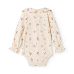 Langærmet baby bodystocking med blomstrprint og krave