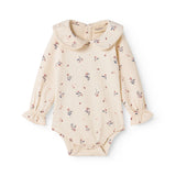 Langærmet baby bodystocking med blomstrprint og krave