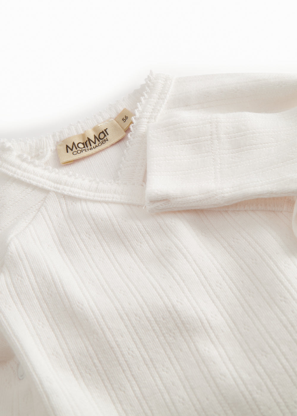 Langærmet hvid pointelle bodystocking til nyfødte