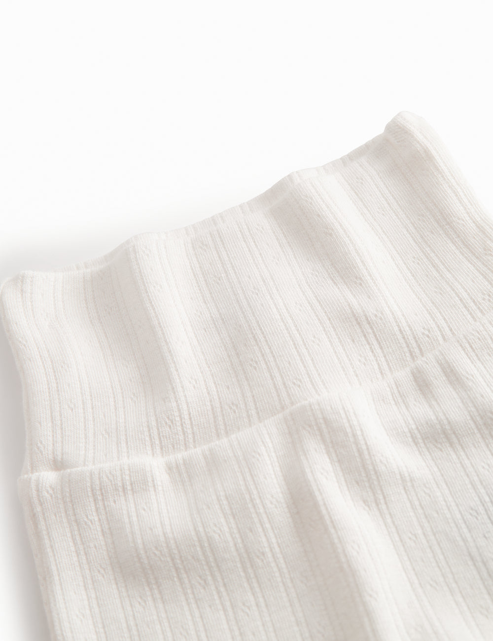 Hvide pointelle bukser med fødder til nyfødt baby