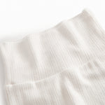 Hvide pointelle bukser med fødder til nyfødt baby