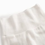 Hvide pointelle bukser med fødder til nyfødt baby