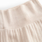 Lyserøde pointelle bukser med fødder til nyfødt baby