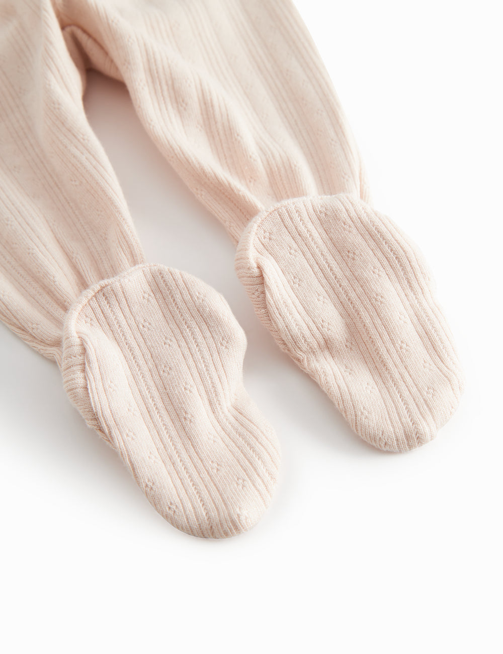 Lyserøde pointelle bukser med fødder til nyfødt baby